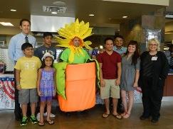Ryan Batac pictured with group and DAISY mascot